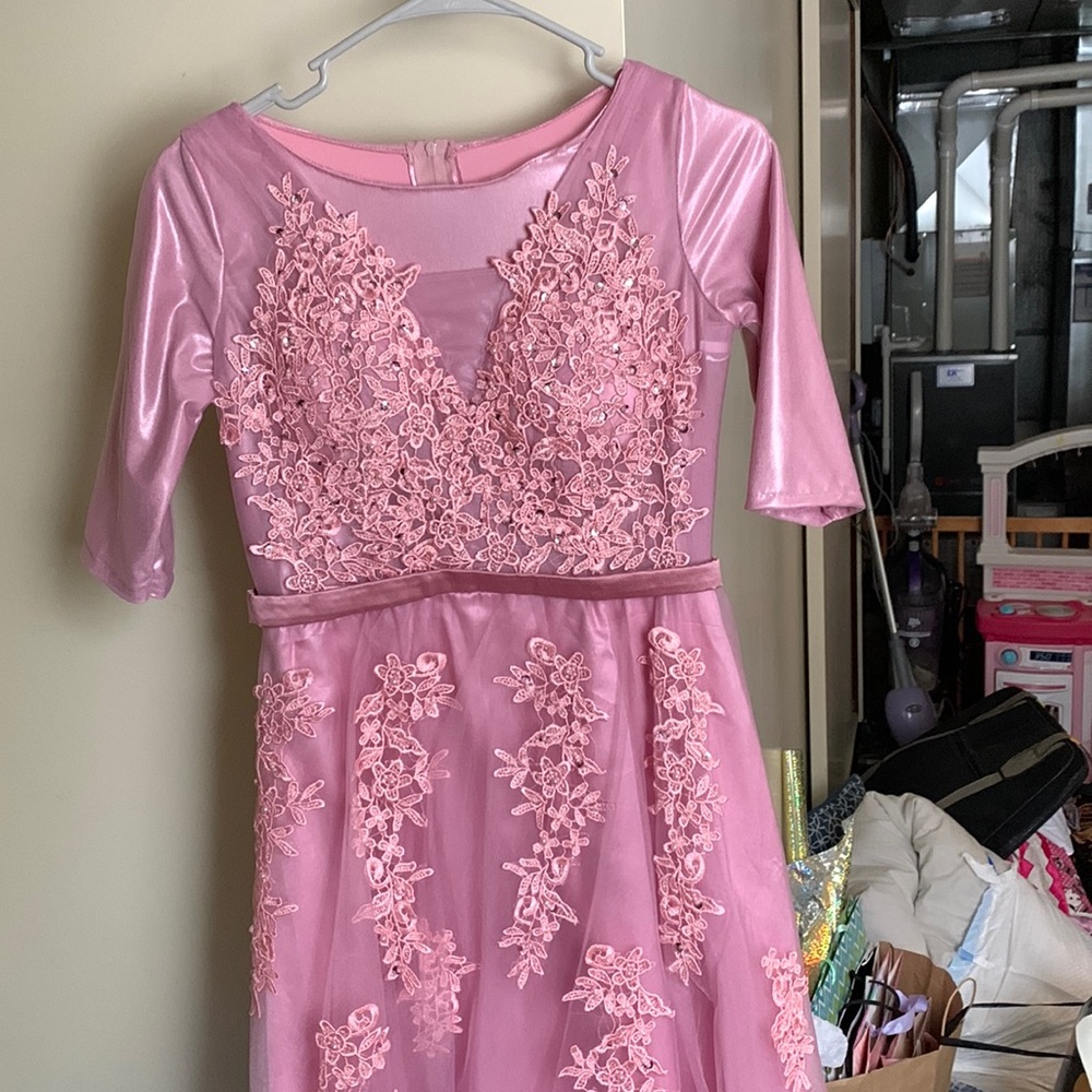 Pinkish, purplish dress with floral beading.